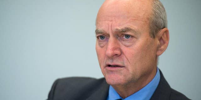 FILE - In this March 18, 2016 file photo head of the Bundesnachrichtendienst, or BND, Gerhard Schindler, speaks in Berlin, Germany. Schindler, who has led the BND since 2012 will step down July 1, Merkel's office said Wednesday, April 27, 2016. (Bernd von Jutrczenka/dpa via AP, file)