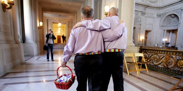 FILE 2008: A male couple inside San Francisco City Hall as they prepare to get married. San Francisco, Calif.