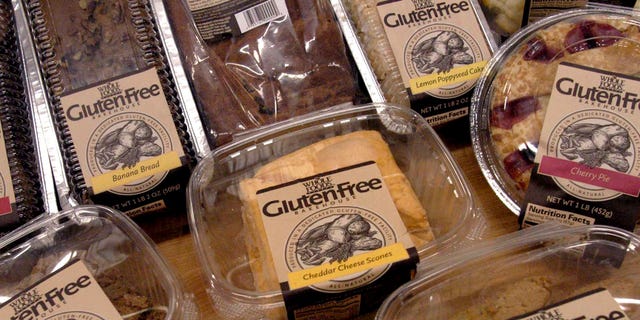 A sample of some of the 27 gluten-free products are displayed, in this Oct. 5, 2004 file photo, at the Whole Foods Market Gluten-Free Bakehouse in Morrisville, N.C. Each label reads "Produced in a Dedicated Gluten-Free Facility." Once banished to the dusty bottom shelves of obscure grocers, the gluten-free revolution is surfacing in the aisles of major supermarkets.