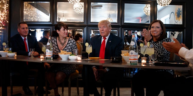 Republican presidential candidate Donald Trump meets with hispanic business leaders at El Sombrero Mexican Cafe, Wednesday, Oct. 5, 2016, in Las Vegas. (AP Photo/ Evan Vucci)