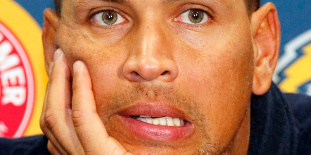 FILE - In this Aug. 2, 2013, file photo New York Yankees' Alex Rodriguez answers questions from the media at a news conference following a Class AA baseball game with the Trenton Thunder against the Reading Phillies in Trenton, N.J. Alex Rodriguez has issued a handwritten apology "for the mistakes that led to my suspension" but has turned down New York's offer to use Yankee Stadium for a news conference and has failed to detail any specifics about his use of performance-enhancing drugs. (AP Photo/Tom Mihalek, File)