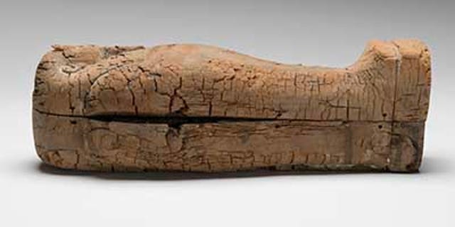 The coffin containing the mummified fetus.