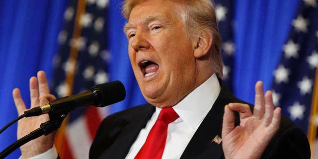 President-elect Donald Trump speaks during a news conference in the lobby of Trump Tower in New York, Wednesday, Jan. 11, 2017, in New York. (AP Photo/Evan Vucci)