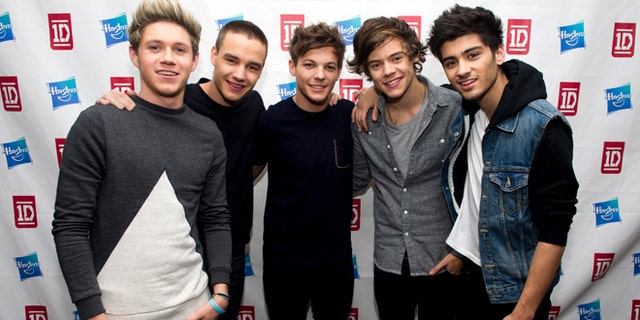 This Nov. 26, 2012 file photo released by hasbro shows members of One Direction, from left, Niall Horan, Liam Payne, Louis Tomlinson, Harry Styles and Zayn Malik at a Hasbro press event in New York.