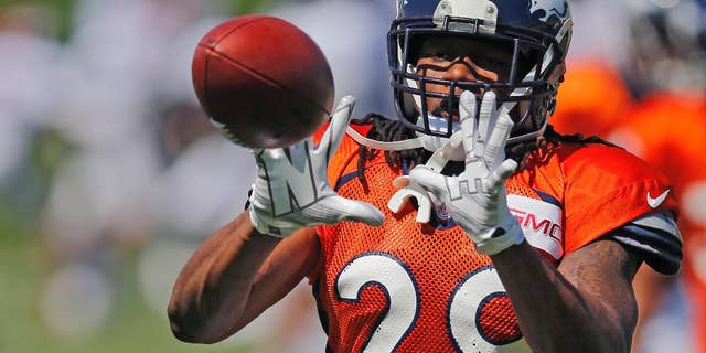 FILE - In this Thursday, Aug. 14, 2014 file photo, Denver Broncos' Bradley Roby runs a drill during NFL football training camp in Englewood, Colo. (AP Photo/Jack Dempsey, File)