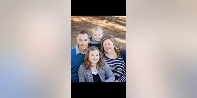 Grace (front) helped save her dad's life after he suffered a medical emergency.