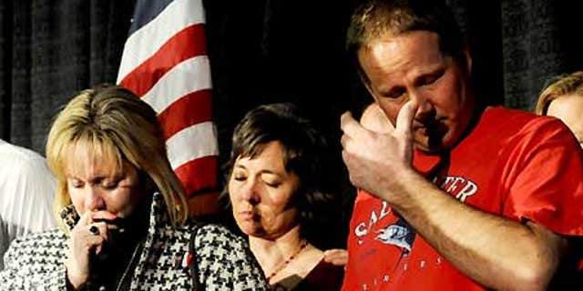 Feb. 18: Lisa Allen and her husband Jim Allen react during a welcome home rally at the Hospitality Room at the Amarillo Civic Center.