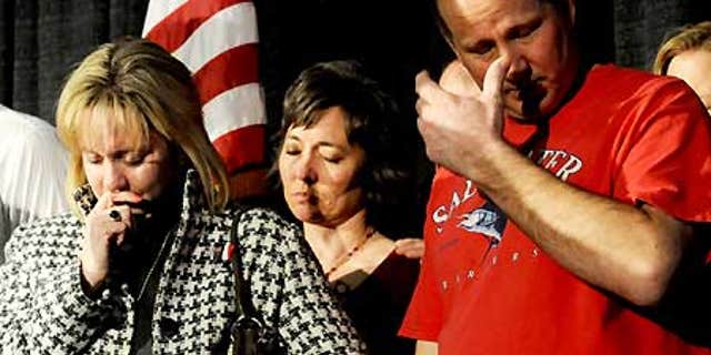 Feb. 18: Lisa Allen and her husband Jim Allen react during a welcome home rally at the Hospitality Room at the Amarillo Civic Center.