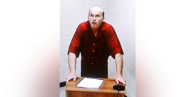 Scott Roeder, seen on June 2, 2009 in a court video from the Sedgwick County Jail in Wichita, Kansas, is in talks with a lawyer to potentially enter a justifiable homicide defense.