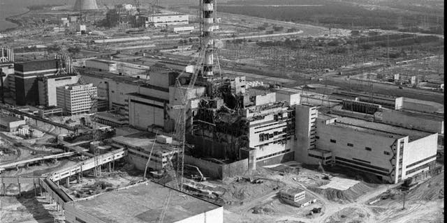A 1986 file photo of an aerial view of the Chernobyl nuclear plant in Chernobyl, Ukraine showing damage from an explosion and fire in reactor four on April 26, 1986 that sent large amounts of radioactive material into the atmosphere.