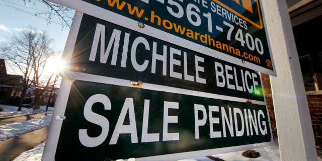 In this Saturday, Jan. 5, 2013, photo, a sale pending is outside a home in Mount Lebanon, Pa. After years in the doldrums, the housing market appears back on track. Home sales and prices are up, and mortgage rates remain near historic lows, reinvigorating the appeal of homeownership. But qualifying for a home loan remains a hurdle for anyone without a solid personal balance sheet. (AP Photo/Gene J. Puskar)