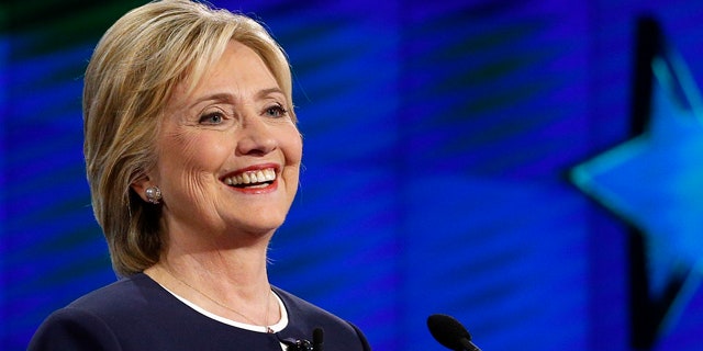 Oct. 13, 2015: Hillary Rodham Clinton smiles during the CNN Democratic presidential debate in Las Vegas. (AP Photo/John Locher)