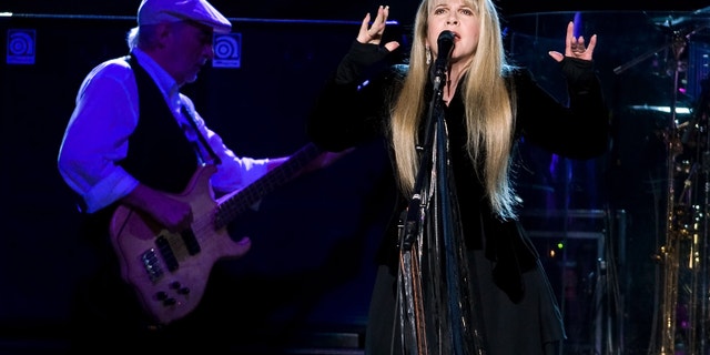This March 19, 2009 file photo shows John McVie, left, and Stevie Nicks of Fleetwood Mac performing at Madison Square Garden in New York.