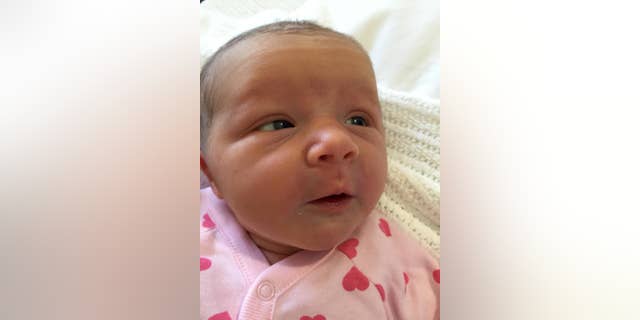In this undated family handout photo distributed by the Australian Department of Foreign Affairs and Trade, baby Violet May Maslin is photographed shortly after her birth, Tuesday, May 10, 2016, in Perth, Australia. An Australian couple whose three children were killed in the downing of Malaysia Airlines Flight 17 two years ago has welcomed baby Violet. (Maslin Family/Australian Department of Foreign Affairs and Trade via AP) MANDATORY CREDIT