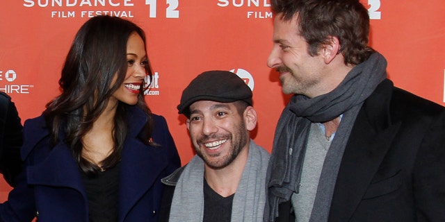 Actress Zoe Saldana, left, co-writer and co-director Lee Sternthal, center, and actor Bradley Cooper pose at the premiere of "The Words" during the 2012 Sundance Film Festival in Park City, Utah on Friday, Jan. 27, 2012. (AP Photo/Danny Moloshok)
