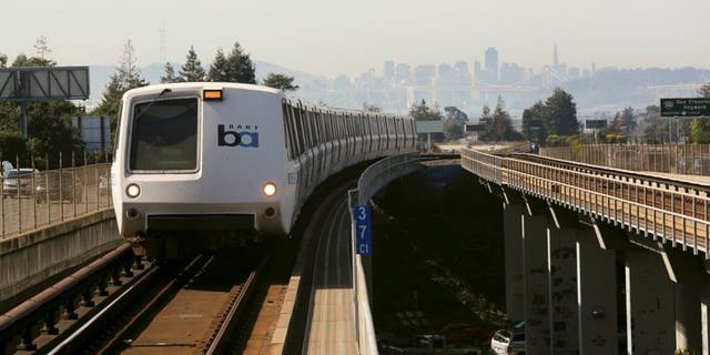 A Bay Area Rapid Transit (BART) train enters the platform area at the Rockridge station in Oakland, California February 12, 2015. (REUTERS/Robert Galbraith)
