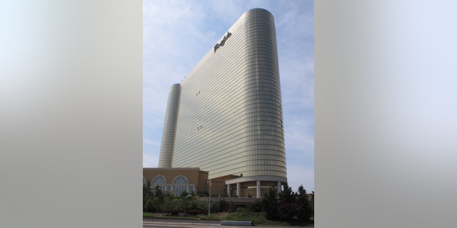 FILE - This June 26, 2013 file photo shows the Borgata Hotel Casino &amp; Spa in Atlantic City, N.J. The casino and state gambling regulators suspended a poker tournament at the Borgata on Jan. 17, 2014 amid an investigation into whether someone used counterfeit gambling chips. (AP Photo/Wayne Parry)