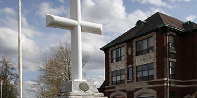 A national atheist organization is seeking to remove this cross from a 91-year-old war memorial in Woonsocket, R.I., claiming it violates separation of church and state.