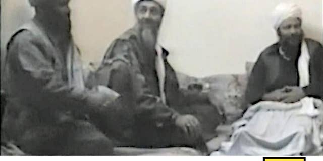 In this undated photo provided by the United States Attorney’s Office for the Southern District of New York, defendant Suliman Abu Ghayth, left, joins al-Qaida founder Osama Bin Laden, center, and an unidentified man somewhere in Afghanistan. Abu Ghayth, Osama Bin Laden’s son-in-law, is being tried in New York for his role as a recruiter and motivational speaker for the terror group. (AP Photo/US Attorney’s Office for the Southern District of New York)