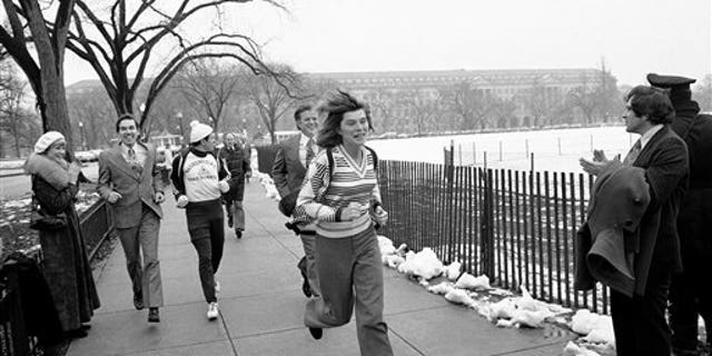 Sen. Edward M. Kennedy, D-Mass, and his sister, Eunice Shriver, jogged and walked a mile on the Ellipse Thursday, Feb. 6, 1975 in Washington to kick off a 3,182-mile fund-raising jaunt for the benefit of the Special Olympics sports program for mentally challenged youngsters. (AP Photo/BD)