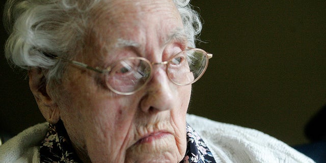 FILE - This file April 2010 photo shows Dina Manfredini of Johnston, Iowa. Manfredini, who inherited the title of world’s oldest person less than two weeks ago, died Monday, Dec. 17, 2012, at age 115, her granddaughter Lori Logli said. She did not elaborate on the cause of her grandmother's death. Manfredini was born on April 4, 1897, in Italy, according to Guinness officials. She moved to the United States in 1920 and settled in Des Moines with her husband. (AP Photo/The Des Moines Register, Lisa Fernandez)