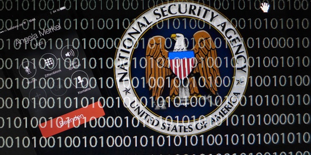 FILE: Oct. 28, 2013: A photo illustration of an NSA logo and a cellphone simulating a call to German Chancellor Angela Merkel, Frankford, Germany.