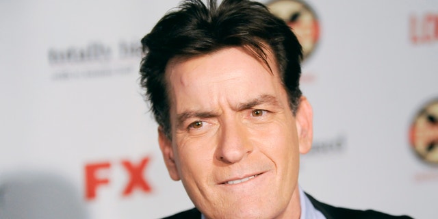 Actor Charlie Sheen arrives at the Hollywood FX Summer Comedies Party in Los Angeles, California June 26, 2012.