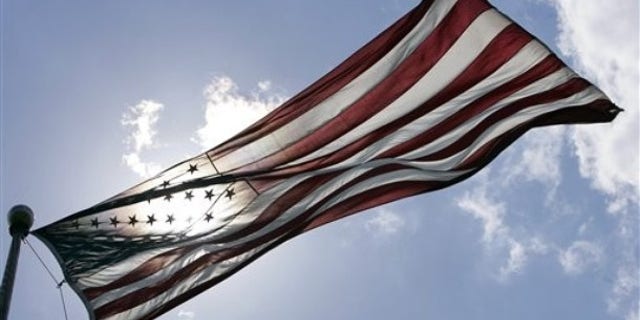 An American Flag flies at Liberty State Park in Jersey City, N.J., Tuesday, June 30, 2009. (AP Photo/Mel Evans)