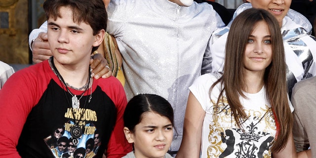 Jan. 26, 2012: This file photo shows, from left, Prince Jackson, Blanket Jackson and Paris Jackson after a hand and footprint ceremony honoring their father musician Michael Jackson in front of Grauman's Chinese Theatre in Los Angeles.