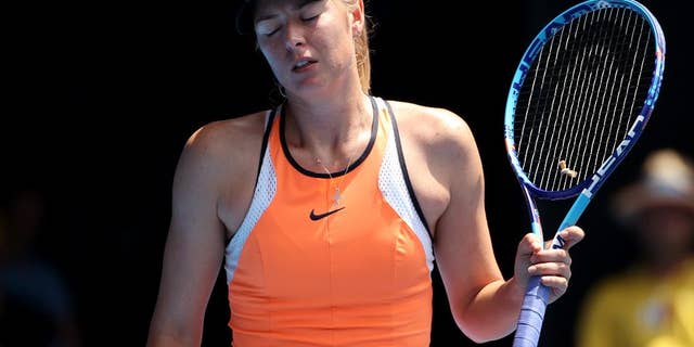 FILE - In this Tuesday, Jan. 26, 2016 file photo, Maria Sharapova of Russia loses a point to Serena Williams of the United States during their quarterfinal match at the Australian Open tennis championships in Melbourne, Australia. Maria Sharapova has appealed her two-year doping ban, Tuesday June 14, 2016, to the highest court in sports, seeking a ruling ahead of the Olympics in Rio de Janeiro (AP Photo/Rick Rycroft, File)