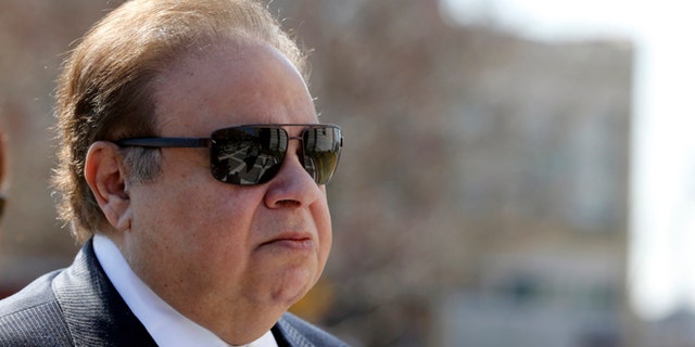 Dr. Salomon Melgen arrives at a Federal Courthouse for his arraignment in Newark, N.J., on April 2, 2015.
