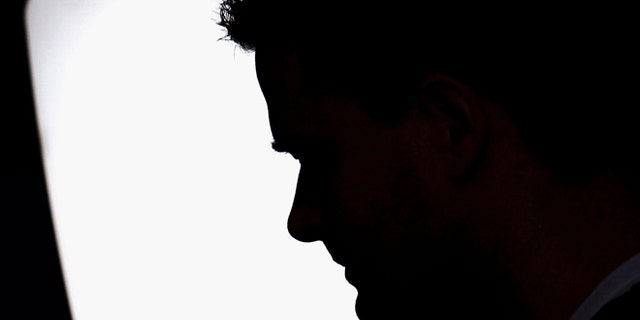 GLASGOW, UNITED KINGDOM - OCTOBER 12: A man suffering from Seasonal Affective Disorder uses a light box in his office to combat the illness on October 12 2005 in Glasgow, Scotland. Seasonal affective disorder (SAD), or winter depression, is a mood disorder related to the change in the seasons and the resulting reduction of exposure to daylight. The end of British Summer time, when clocks go back one hour at the end of October, will see most people making their daily commute in darkness both ways. With winter nights stretching to 19 hours in the UK, and Scotland's often inclement weather, it is estimated that the "Winter Blues" can affect up to 20% of the population. (Photo by Christopher Furlong/Getty Images)