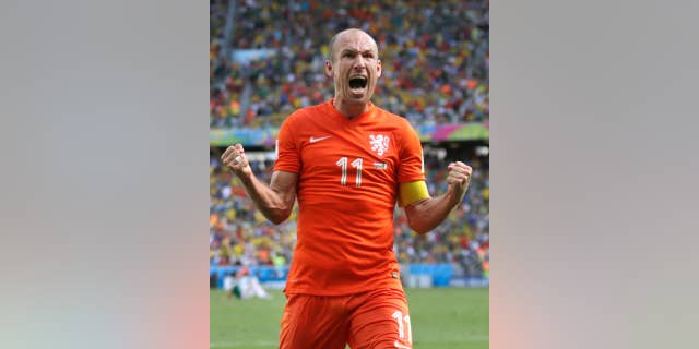 Netherlands' Arjen Robben celebrates after the World Cup round of 16 soccer match between the Netherlands and Mexico at the Arena Castelao in Fortaleza, Brazil, Sunday, June 29, 2014. The Netherlands won the match 2-1. (AP Photo/Wong Maye-E)