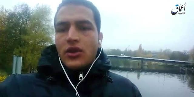 Dec. 23, 2016: This image made from video released by ISIS, shows Anis Amri, a Tunisian suspect in the Berlin truck attack, pledging allegiance to its leader Abu Bakr al-Baghdadi and vowing to fight against what he calls "the Crusader pigs."