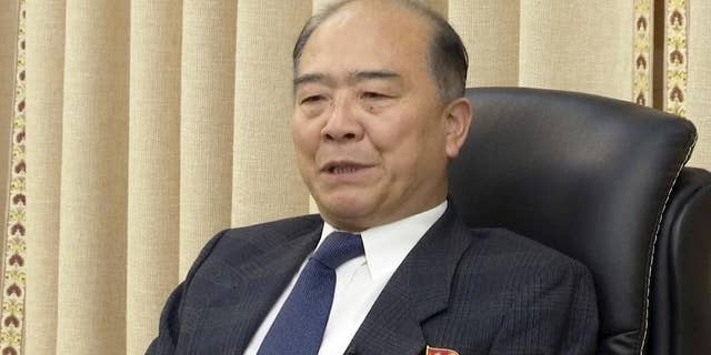 In this photo made from video, Ju Wang Hwan, Senior Researcher, Institute of Disarmament and Peace, North Korean Ministry of Foreign Affairs speaks during a media briefing, Thursday, Dec. 22, 2016, in Pyongyang, North Korea. North Korea's Foreign Ministry on Thursday accused South Korea of committing "political terror" by stepping up efforts to encourage defections by North Koreans overseas, especially diplomats. (AP Photo)