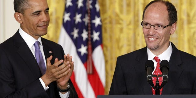 President Barack Obama applauds in the East Room of the White House in Washington, Monday March 18, 2013, where he announced he would nominate Thomas E. Perez, right, for Labor Secretary. (AP Photo/Jacquelyn Martin)