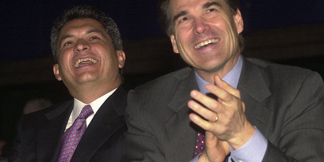 August, 22, 2001: Governor Tomas Yarrington (L) of the state of Tamaulipas, Mexico, and Texas Governor Rick Perry listen to remarks during the U.S. and Mexico Border Summit in Edinburg, TX. (Photo by Alicia Wagner Calzada/Getty Images)