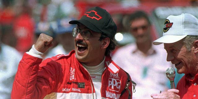 FILE - In this May 31, 1986 file photo, Bobby Rahal reacts after accepting the keys to the Chevrolet Corvette pace car after winning the 70th running of the Indianapolis 500 auto race in Indianapolis, Ind. (AP Photo/File)