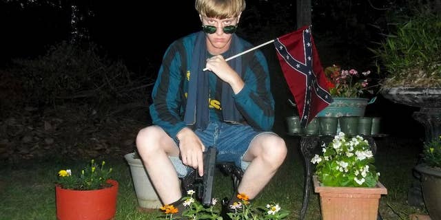 Investigators said Elizabeth Lecron had been exchanging letters with Dylann Roof, seen here, a white supremacist sentenced to death in the killings of nine black worshippers in a racist attack at a South Carolina church. (Lastrhodesian.com via AP, File)