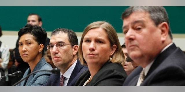 Cheryl Campbell, Senior Vice President of CGI Federal; Andrew Slavitt, Executive Vice President for Optum/QSSI; Lynn Spellecy, corporate counsel for Equifax Workforce Solutions and John Lau, program director for Serco are pictured at a House Energy and Commerce Committee hearing on the Patient Protection and Affordable Care Act on Capitol Hill in Washington, Oct. 24, 2013. (REUTERS/Jason Reed)