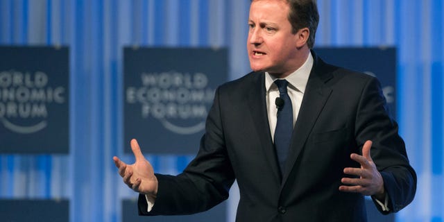 British Prime Minister, David Cameron, gestures as he speaks to the assembly of the 43rd Annual Meeting of the World Economic Forum, WEF, in Davos, Switzerland, Thursday, Jan. 24, 2013. (AP Photo/Michel Euler)