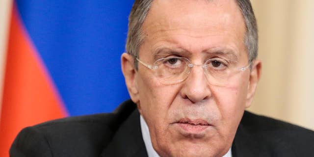 Russian Foreign Minister Sergey Lavrov listens for a question during a shared news conference with High Representative of the European Union for Foreign Affairs Federica Mogherini following their talks n Moscow, Russia, Monday, April 24, 2017. Lavrov has vowed to use Moscow's influence to get Ukraine's separatist rebels to comply with a cease-fire deal. (AP Photo/Ivan Sekretarev)