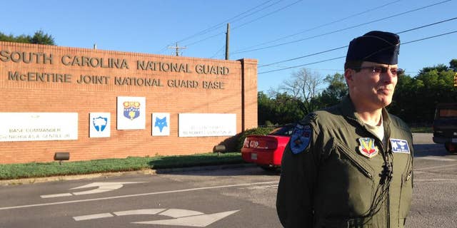 Base commander Col. Nicholas Gentile speaks with reporters outside McEntire Joint National Guard Base in Eastover, SC., Wednesday June 8, 2016. Two F-16C South Carolina Air National Guard jets collided over eastern Georgia, Tuesday evening. Gentile says the planes were totally destroyed, but the pilots ejected and survived, and have returned to South Carolina. (AP Photo/Susanne M. Schafer)