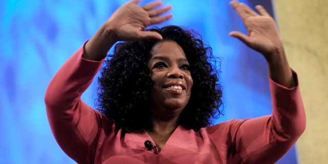 June 16: Oprah Winfrey greets the crowd before talking with Paula Zahn during the National Cable & Telecommunications Association's Cable Show 2011 at McCormick Place in Chicago.