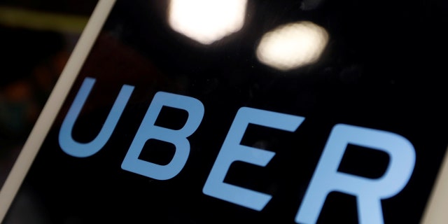 The logo of Uber is seen on an iPad, during a news conference to announce Uber resumes ride-hailing service, in Taipei, Taiwan April 13, 2017