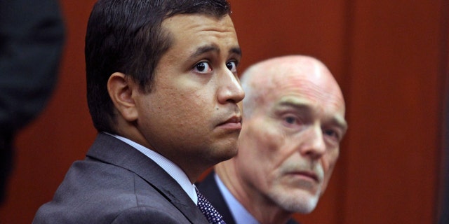 George Zimmerman, left, and attorney Don West at the Seminole County Criminal Justice Center in Sanford, Fla.