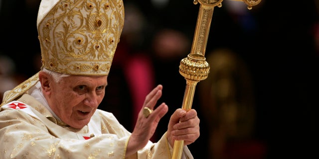FILE - In this Thursday, Dec. 25, 2008, file photo, Pope Benedict XVI holds the pastoral staff as he celebrates Christmas midnight Mass in St. Peter's Basilica at the Vatican. Declaring that he lacks the strength to do his job, Benedict announced Monday Feb. 11, 2013, he will resign Feb. 28 _ becoming the first pontiff to step down in 600 years. His decision sets the stage for a mid-March conclave to elect a new leader for a Roman Catholic Church in deep turmoil. (AP Photo/Gregorio Borgia, File)