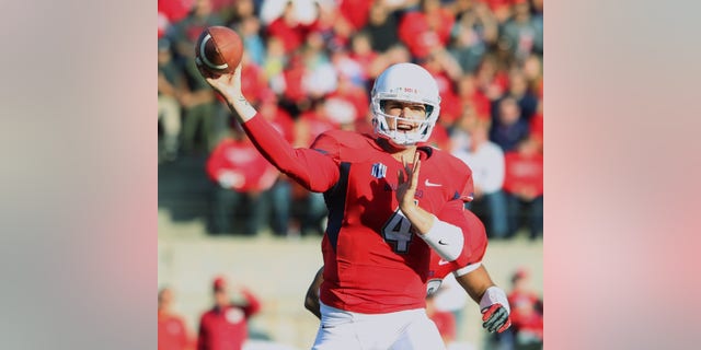 Derek Carr throws a pass against New Mexico on his way to 527 yards in the first half of an NCAA college football game in Fresno, Calif., Saturday, Nov. 23, 2013. (AP Photo/Gary Kazanjian)