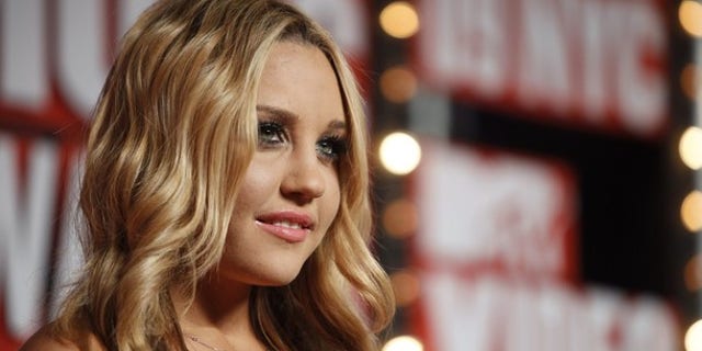 Actress Amanda Bynes arrives at the 2009 MTV Video Music Awards in New York, September 13, 2009. REUTERS/Lucas Jackson (UNITED STATES ENTERTAINMENT)