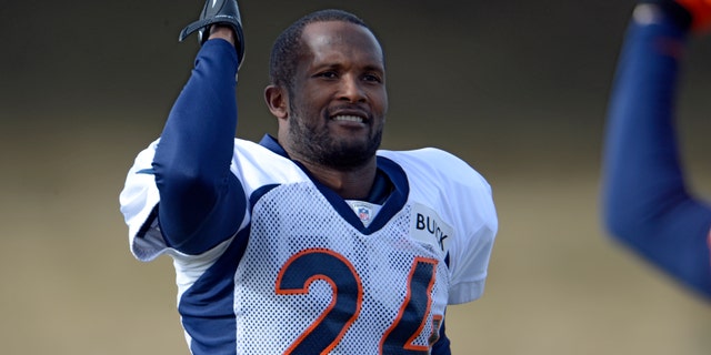 Denver Broncos cornerback Champ Bailey gestures during the NFL football team's practice Tuesday, Jan. 8, 2013, in Englewood, Colo. The Broncos play the Baltimore Ravens at home on Saturday in a playoff game. (AP Photo/The Denver Post, John Leyba) MAGS OUT TV OUT